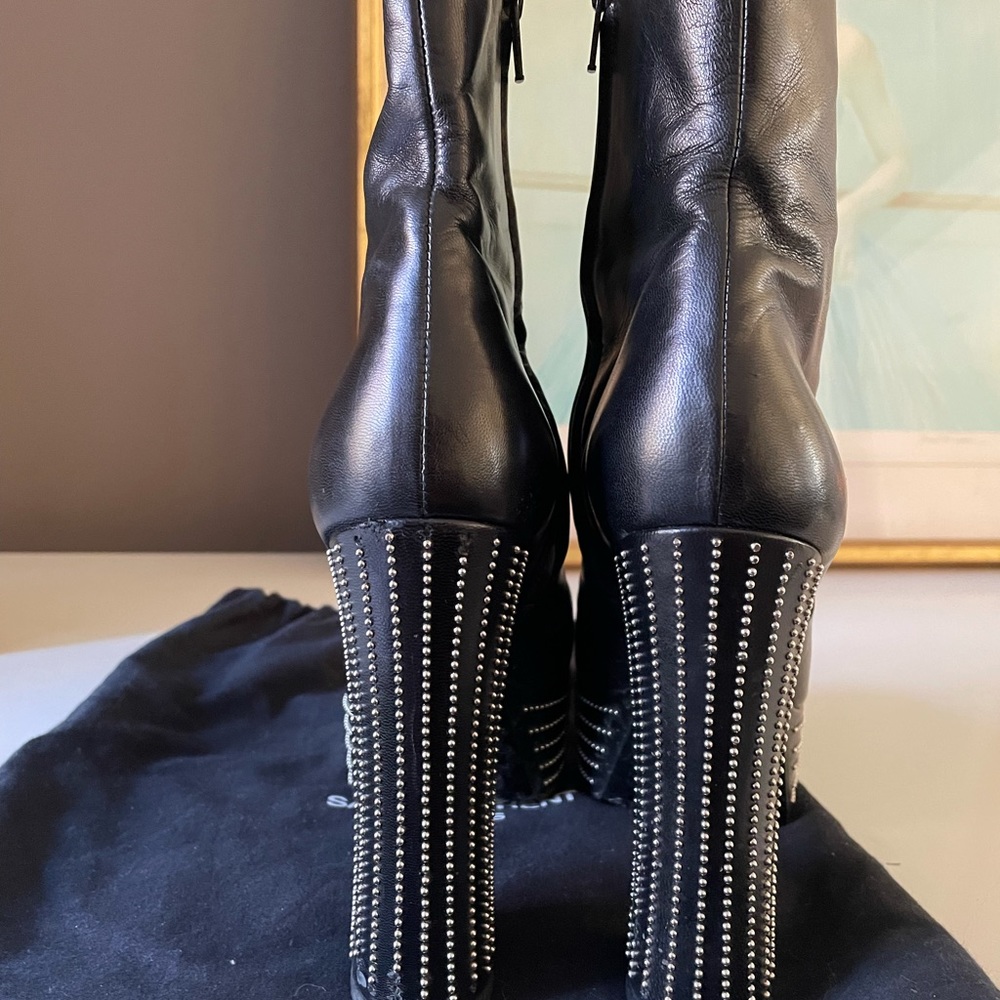 Saint Laurent black platform boots. Stud details on heal and platform.